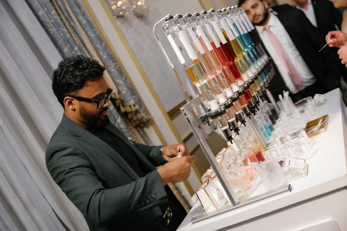 Naheen mixing a custom fragrance at the Jahan Fragrances perfume bar